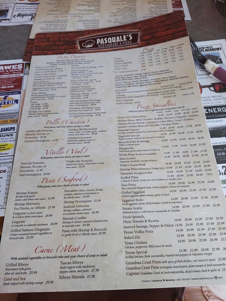 Menu page showing calzone and soups.